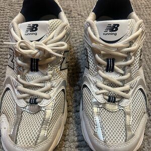 New Balance 530 Sneakers in White and Navy Blue